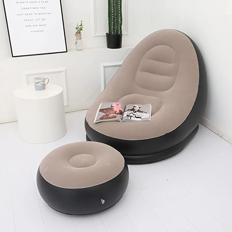 Inflatable lounge chair with a footrest, elegantly displayed to showcase its comfort and design. The footrest is visible, emphasizing the chair's complete setup