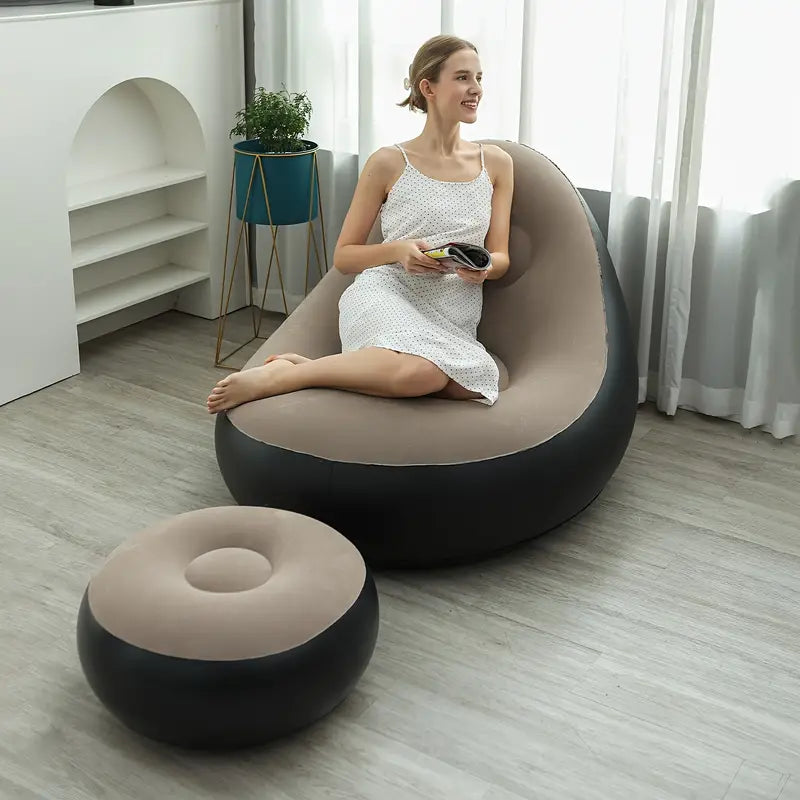 Girl sitting on the premium inflatable air sofa, showcasing its comfort and durability. The image highlights the sofa’s high-quality flock and thick PVC material, demonstrating its inflated state.